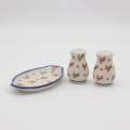 Salt and pepper shakers with tray A12 D141 – hand-painted Bolesławiec pottery in a traditional pattern, an elegant spice set for the table.