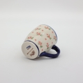 Mug BEL A38 D141 – hand-painted Bolesławiec pottery in a traditional pattern, practical and decorative for everyday use.