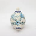 Each dove is carefully shaped from natural clay and hand-painted by skilled Bolesławiec artisans, making every piece truly one-of-a-kind.