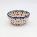 Boleslawiec ceramic bowl, hand-painted Polish pottery with traditional pattern.