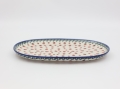 Półmisek ceramiczny Bolesławiec 33 cm na stole – elegancka polska ceramika.