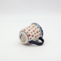 TULIPAN ceramic mug with an elegant tulip-shaped form.