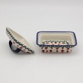 Its sturdy construction makes the butter dish durable and easy to clean. The lid protects the butter from drying out and from contaminants, while its classic or modern design fits perfectly into a variety of table settings.