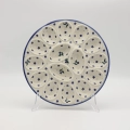 Hand-painted ANDY egg plate made from traditional Bolesławiec pottery. A functional serving dish perfect for presenting eggs for breakfast or festive occasions.