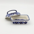 Hand-painted butter dish made from traditional Bolesławiec pottery. A practical and elegant container perfect for storing and serving butter.