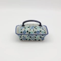 Hand-painted butter dish made from traditional Bolesławiec pottery. A practical and elegant container perfect for storing and serving butter.