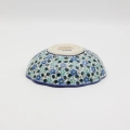 Each bowl is hand-formed and hand-decorated using traditional stamping techniques.