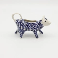 The 100 ml capacity is perfectly measured for serving cream or milk for several people, while the precisely shaped cow's mouth allows for easy pouring without spilling a drop on the tablecloth.