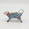 This ceramic cow-shaped creamer with a 100 ml capacity is an absolute classic of Bolesławiec craftsmanship, combined with a joyful design that will liven up any table and make your coffee ritual even more pleasant.
