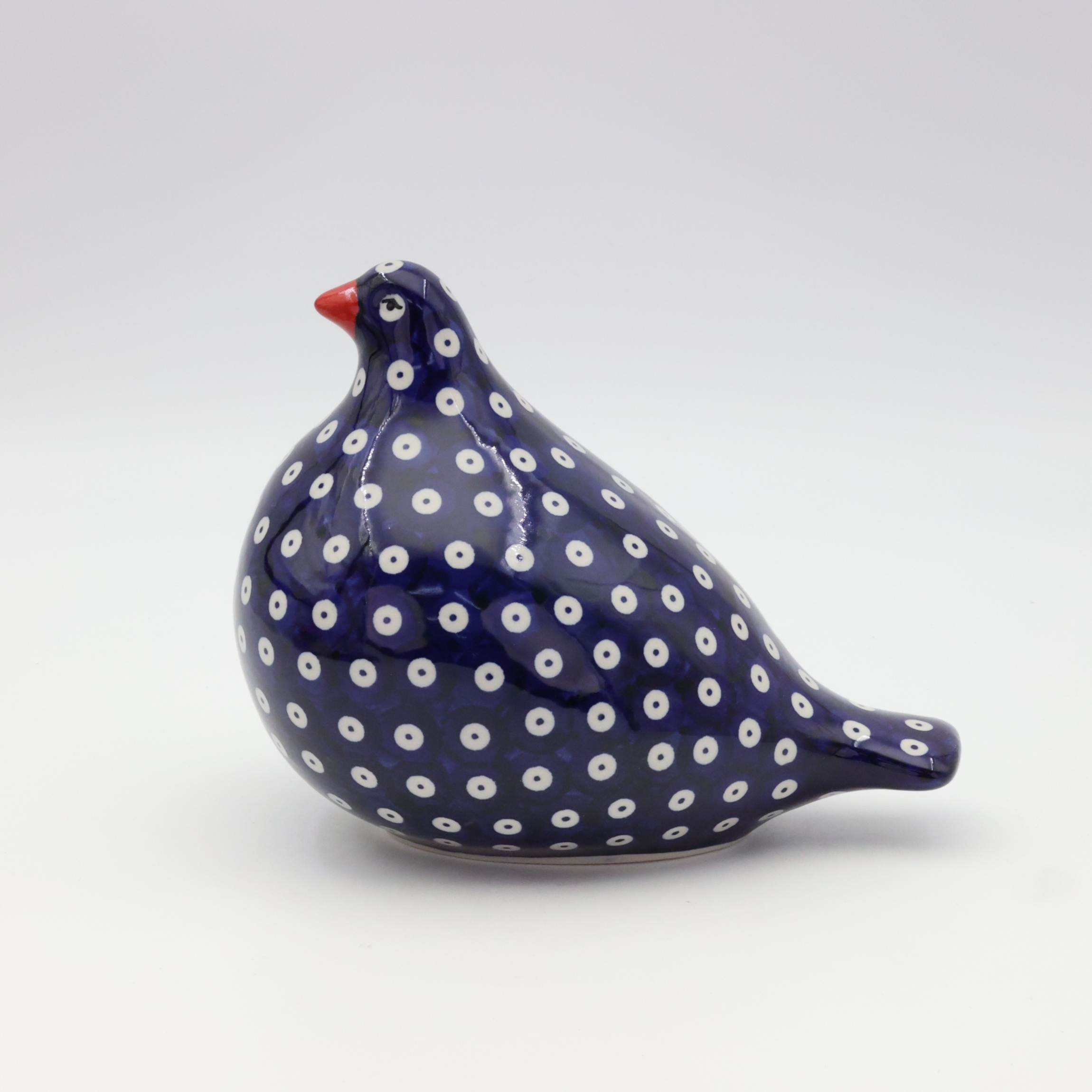 Hand-painted Bolesławiec ceramic pigeon figurine.