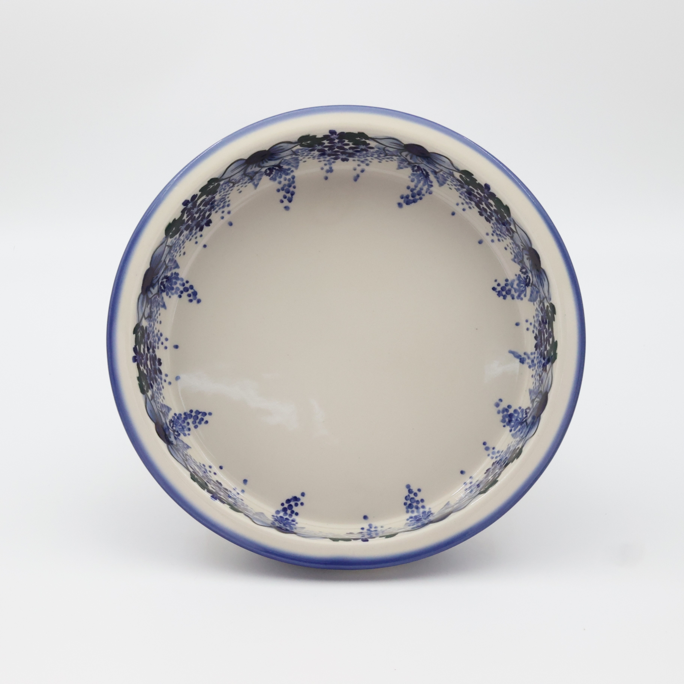 Okrągłe ceramiczne naczynie do zapiekania z Bolesławca, ręcznie zdobiona ceramika bolesławiecka, polskie rękodzieło artystyczne do piekarnika, mikrofalówki i zmywarki.