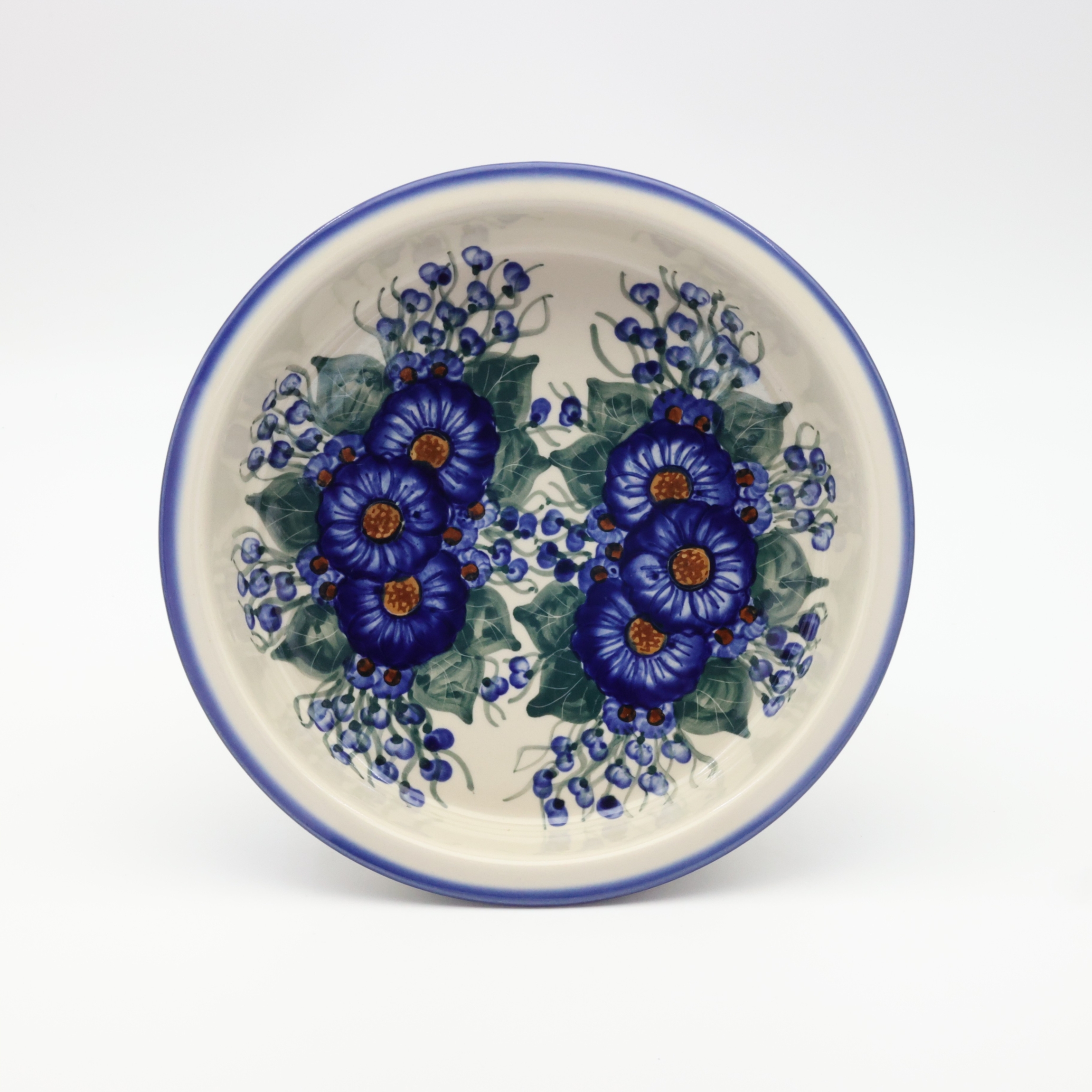 Okrągłe ceramiczne naczynie do zapiekania z Bolesławca, ręcznie zdobiona ceramika bolesławiecka, polskie rękodzieło artystyczne do piekarnika, mikrofalówki i zmywarki.