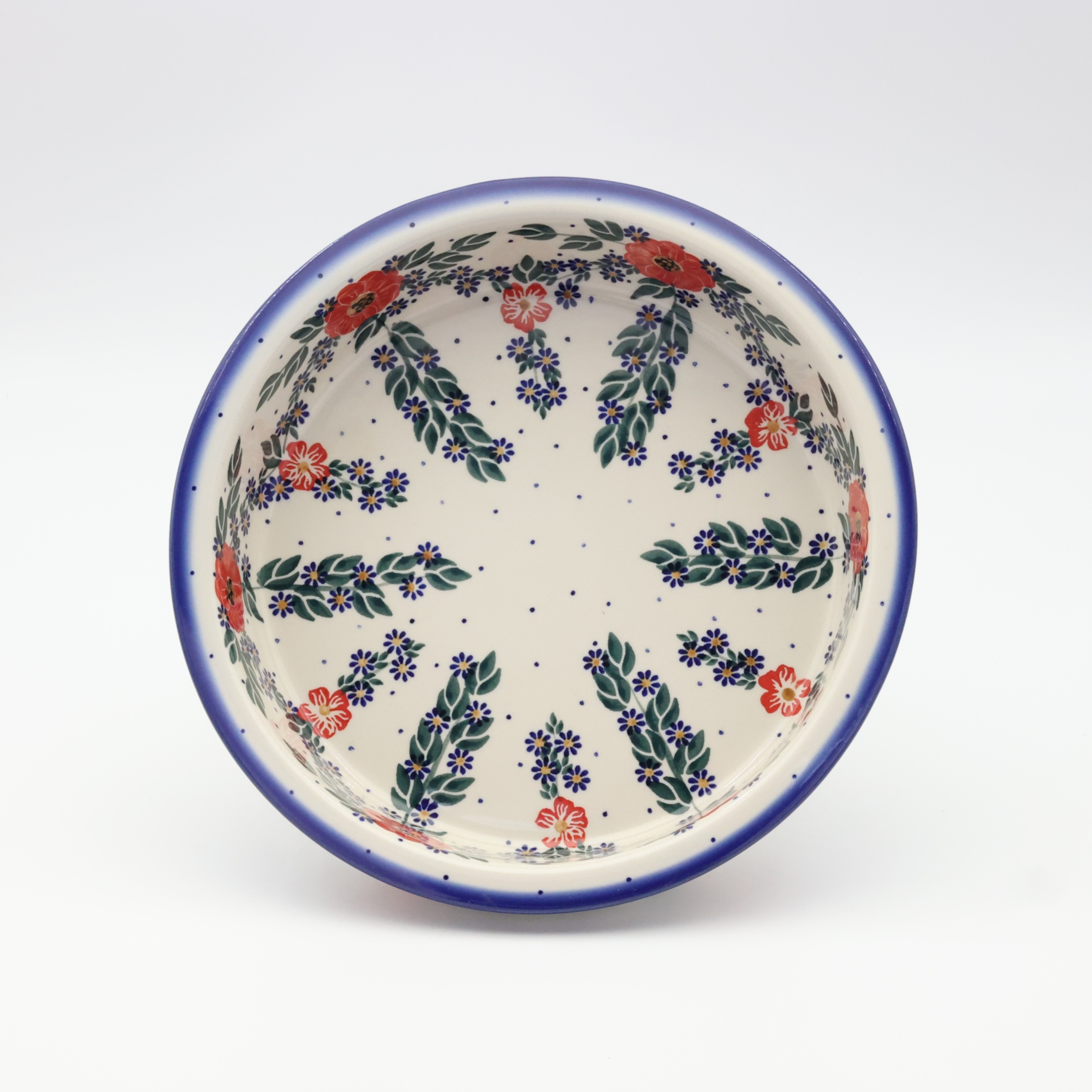 Okrągłe ceramiczne naczynie do zapiekania z Bolesławca, ręcznie zdobiona ceramika bolesławiecka, polskie rękodzieło artystyczne do piekarnika, mikrofalówki i zmywarki.