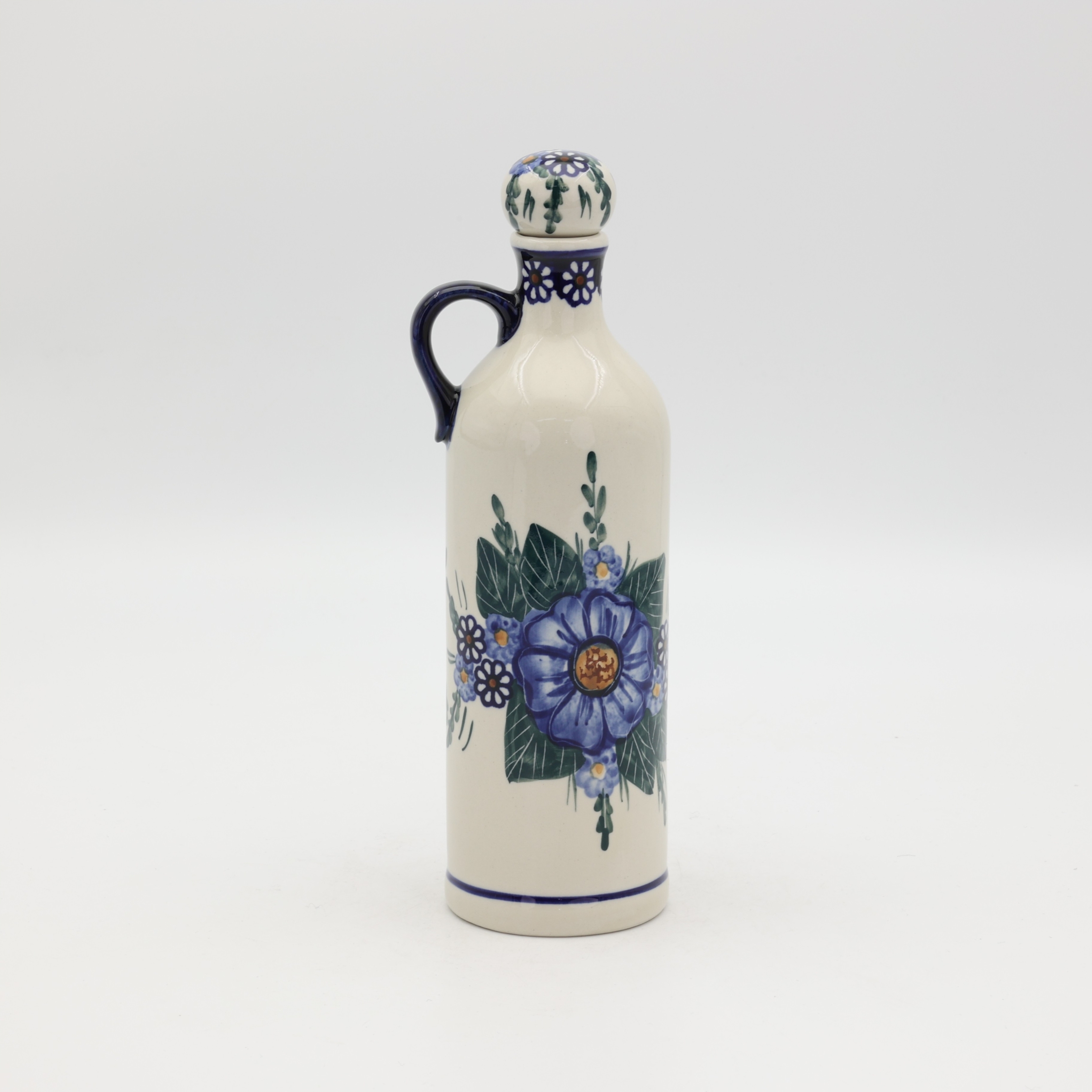 Hand-painted 0.8L ceramic bottle with cork made from traditional Bolesławiec pottery. Perfect for storing liqueurs, olive oil, water, or as a kitchen decoration.