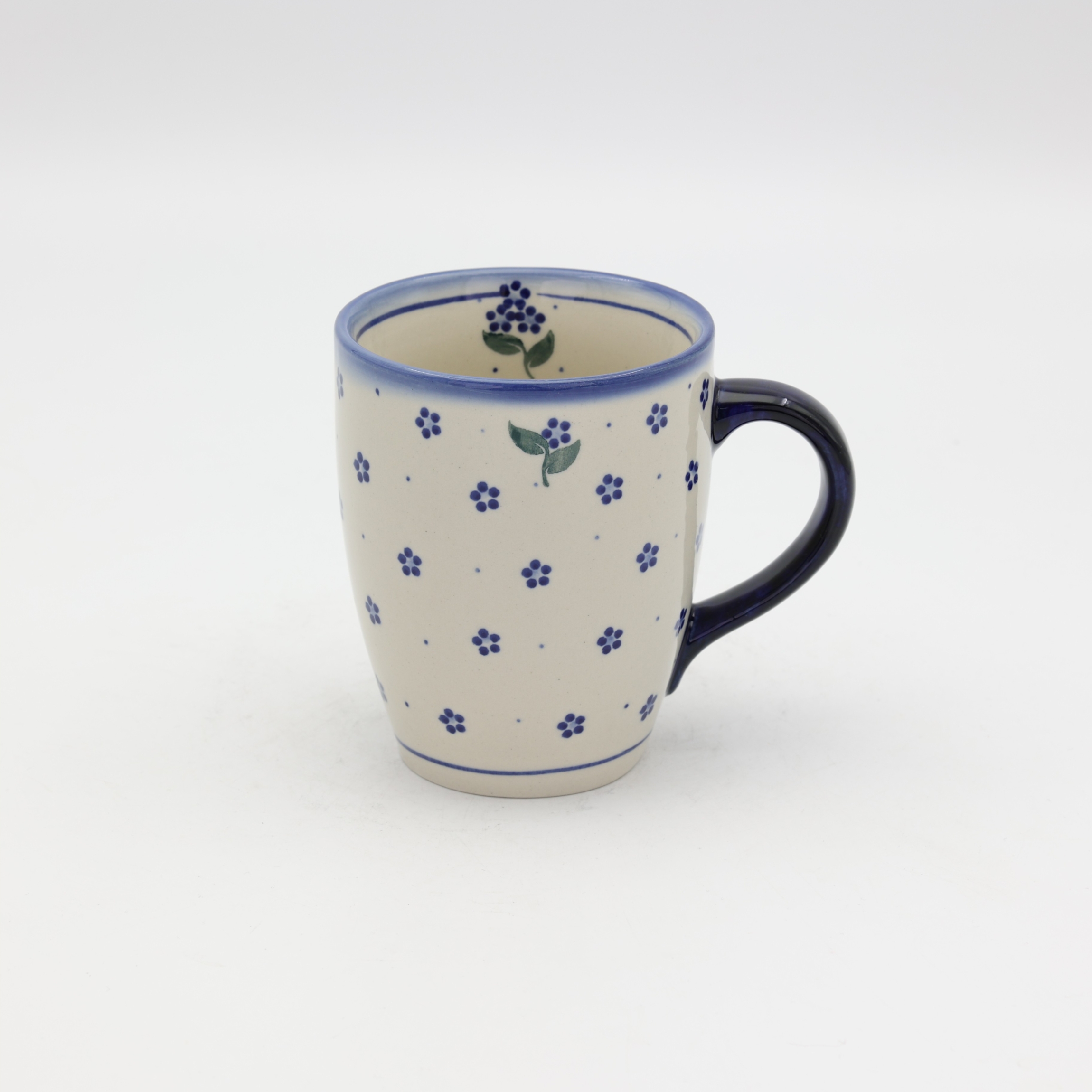 Hand-painted BEL mug made from traditional Bolesławiec pottery. A stylish mug perfect for coffee, tea, and everyday use.